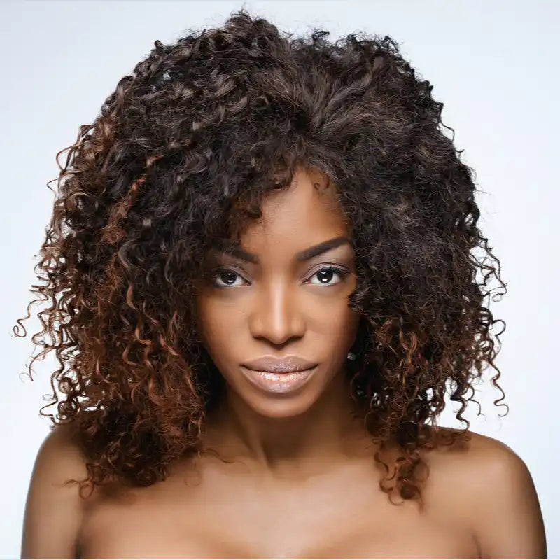 Woman with curly hair.