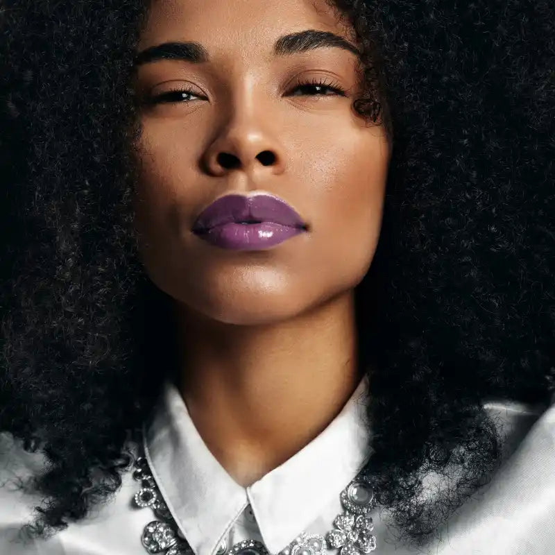 Woman with purple lipstick.